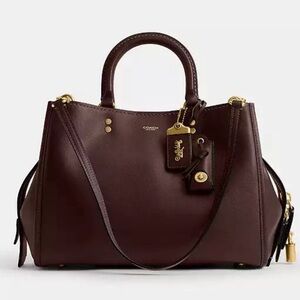 Coach Rogue 31 maple/brass